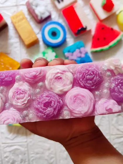 A full loaf of the lavender floral soap, showing the beautiful and detailed top.
