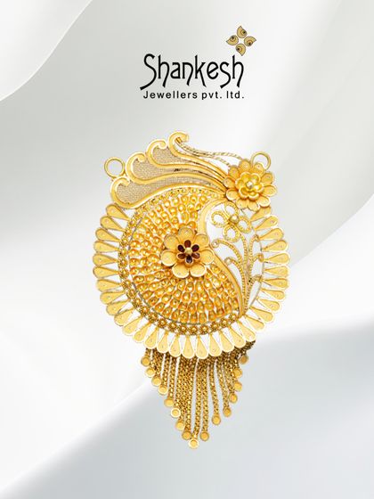 Forged in gold, made for eternity. This stunning pendant features an intricate paisley design with detailed filigree work, a true work of art.