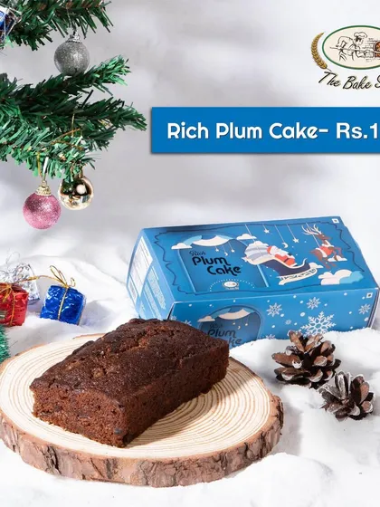 This rich plum cake is perfect for a smaller treat or as part of a gift hamper. It offers the same traditional flavor in a more compact size.