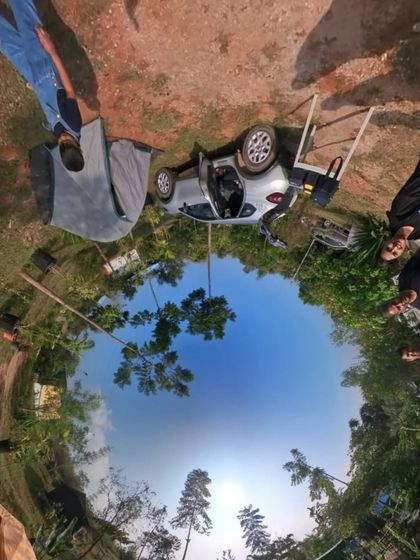 A fun, 360 degree "tiny planet" photo of our campsite, capturing the adventurous and playful spirit of our outdoor events.