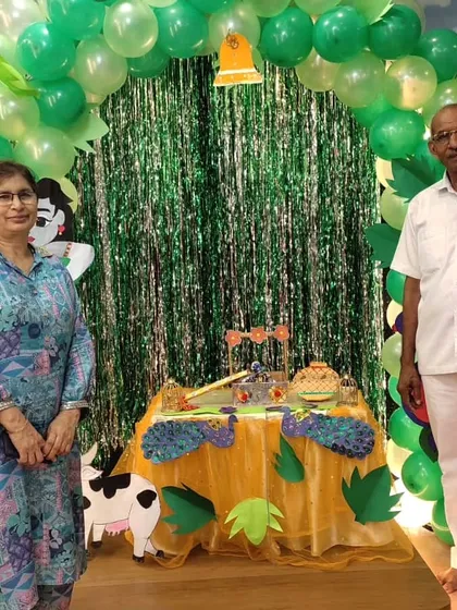 Grandparents join in the fun, posing at our Janmashtami photo booth. Our family-friendly events are designed for all generations to enjoy.