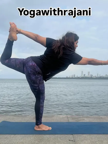Here I am in Natarajasana, the Lord of the Dance Pose, against the Mumbai skyline. This challenging balance pose builds focus and strength. I invite you to join my morning or evening batches to improve your health and lifestyle.