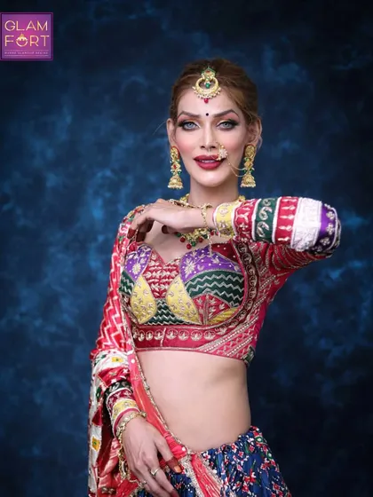 Another stunning shot of our Navratri collaboration. This showcases the intricate details of the outfit and the complementary makeup.