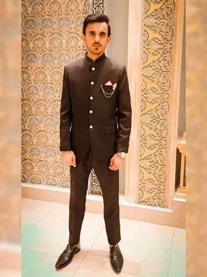 A full-length shot of a groom in a Jodhpuri suit. This is a great option for a formal event, offering a blend of tradition and modernity.