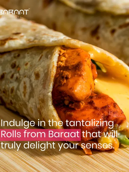 Indulge in the tantalizing Rolls from Baraat that will truly delight your senses, like this one filled with tender, flavorful chicken.