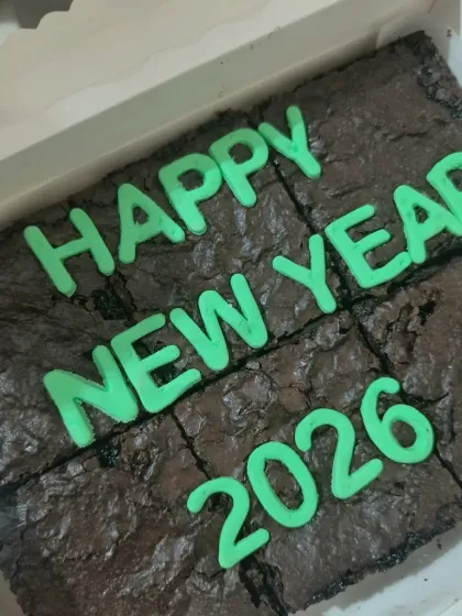 You can even get a personalized message on a brownie slab. This one was a fun way to celebrate the new year, with "Happy New Year 2026" written in green frosting.