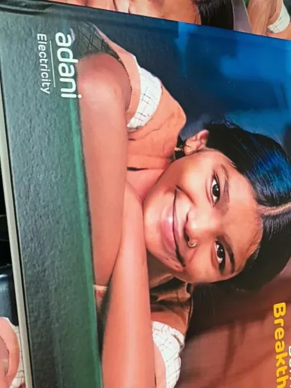 A custom-branded box for Adani Electricity, part of the Women's Day gifting project. The packaging prominently features the company's branding and event theme, ensuring a cohesive brand message.