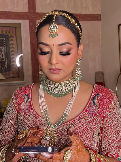A closer look at the eye makeup for this dusky bride. The soft glam approach with defined eyes and a natural base creates a look that is both elegant and striking.