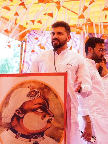 Addressing the gathering at the International Jat Divas, speaking about the contributions of the community and the challenges facing today's youth.