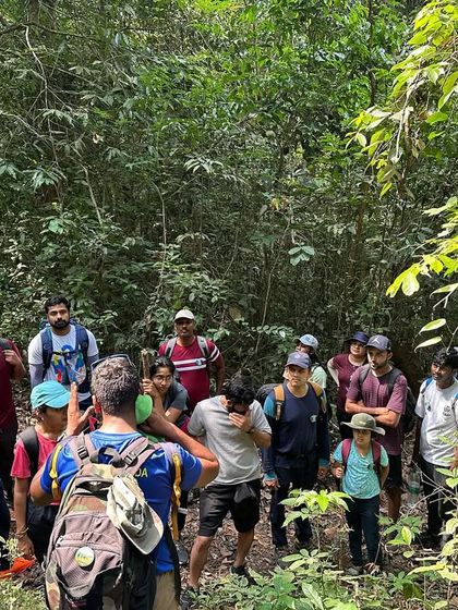 A briefing session in the middle of the forest before we start our trek along the river.
