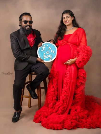 A fun gender reveal moment! This couple is all smiles as they announce they are expecting a boy.