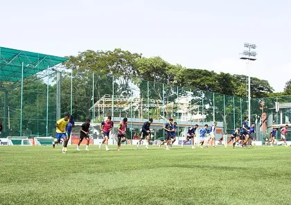 A group of elite footballers performing acceleration drills during our off-season camp. These sessions are designed to build explosive power and improve first-step quickness, a critical attribute in football.