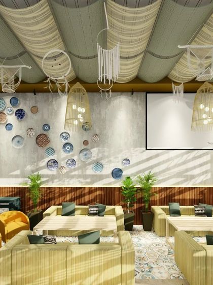 A render of another seating area in the proposed rooftop lounge, featuring comfortable sofas, a decorative plate wall, and unique woven light fixtures.