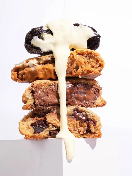 Action shots are my favorite for making food look irresistible. Capturing the moment this white chocolate sauce pours over a stack of cookies creates a sense of motion and deliciousness that makes you crave a bite. It’s a key technique in modern food styling.