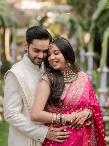 A heartwarming portrait of the couple after their first look, their embrace filled with happiness and relief.