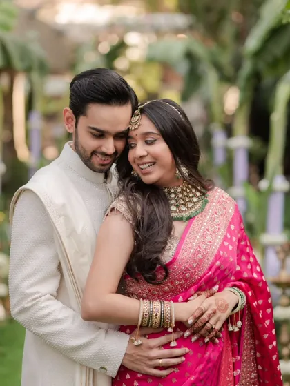 A heartwarming portrait of the couple after their first look, their embrace filled with happiness and relief.