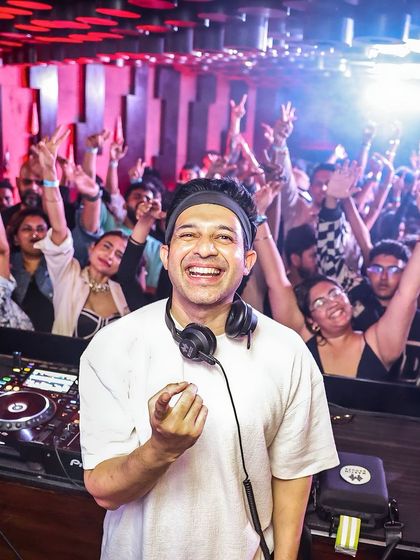 A shot that perfectly captures the joy and energy of the crowd at Kitty Ko, The Lalit Ashok. Seeing everyone with their hands up is the best reward.