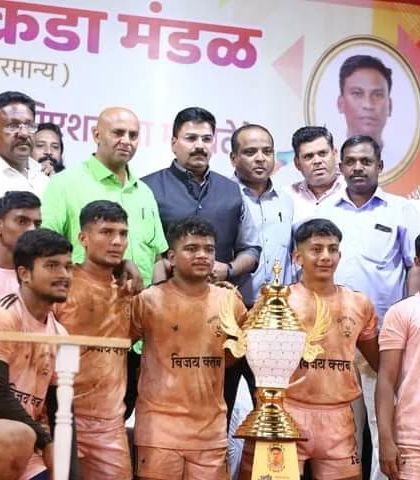 A close-up of our young players with their trophy and the tournament officials.