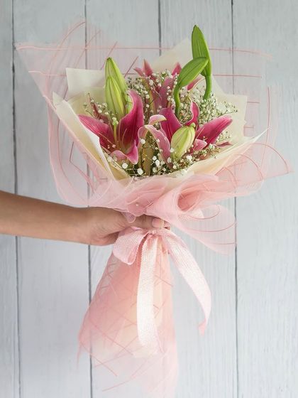 The ultimate romantic trio: fresh lilies, a dreamy cake, and a curated hamper. We can deliver this perfect surprise across Mumbai within 24 hours.