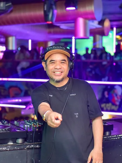 Behind the decks is my happy place. Whether I'm teaching or performing, it's all about sharing the music and the energy. When you come for a demo, this is the vibe you can expect.