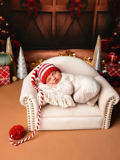 The cutest little Christmas elf. I love creating seasonal and festive setups to celebrate the time of year your baby was born.
