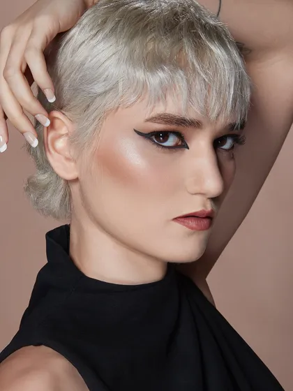 A classic winged eyeliner look, executed with perfect precision. Mastering this timeless style is a key skill for any professional makeup artist.