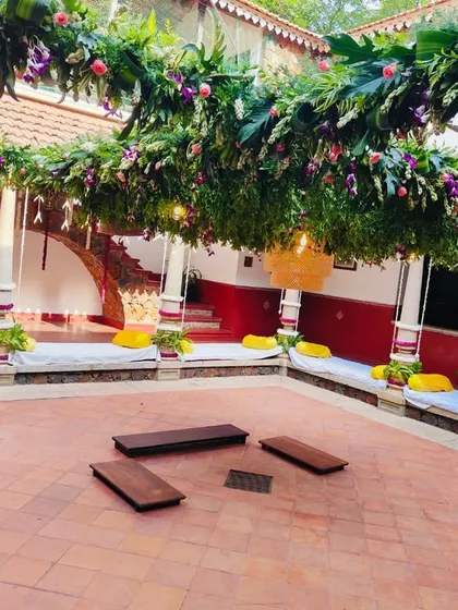 This angle showcases the full scope of the courtyard wedding decoration, highlighting the harmony between the decor and the traditional architecture.