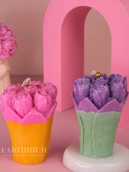 A vibrant pillar candle shaped like a bouquet of tulips, available in bright, cheerful colors.