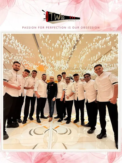 Our team of 15 bartenders in coordinated traditional attire, ready to serve at a grand reception at the Fairmont Doha.