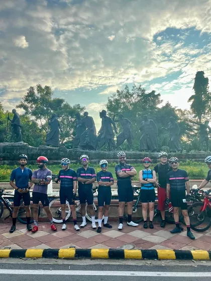 The group posing together to celebrate a member's birthday.