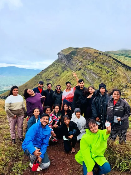 A dynamic video showing a group of friends having a blast at the Z-point viewpoint in Chikmagalur, capturing the fun and energy of the trip.