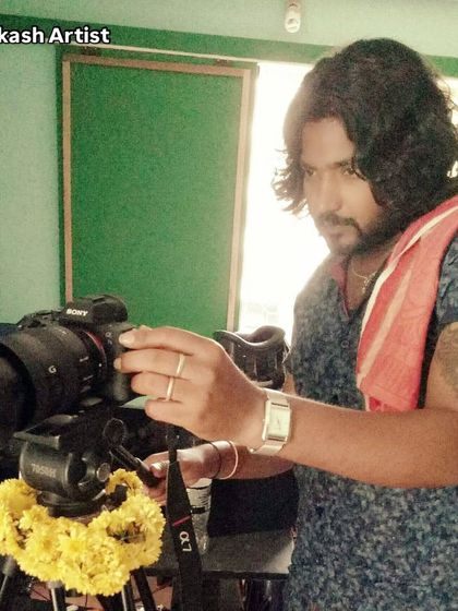 A throwback photo of me behind the camera. My journey in the creative field started long ago, and my passion for art has always been my driving force.