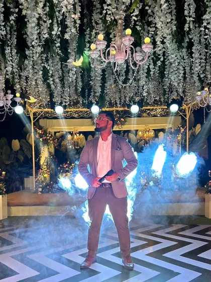 I bring a touch of class and a whole lot of energy to private celebrations. This shot from a beautiful Sangeet night captures the grand, vibrant atmosphere I love to create for weddings and special occasions.