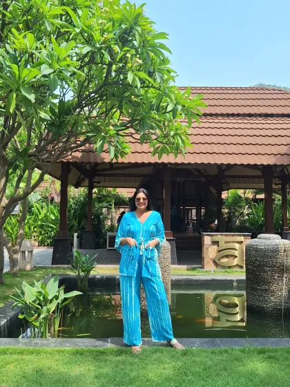 A vibrant blue co-ord set is a great choice for a day spent exploring a resort's beautiful gardens.