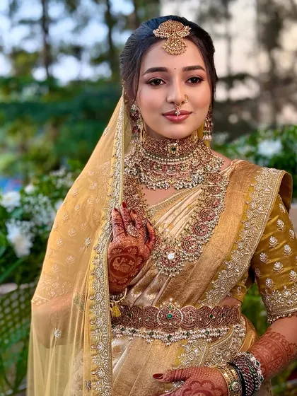 A portrait of royal elegance. For Nischaya, I created a look that balances opulent tradition with a soft, modern touch, letting her natural grace shine through. This is the essence of my artistry: timeless, regal, and personally tailored.