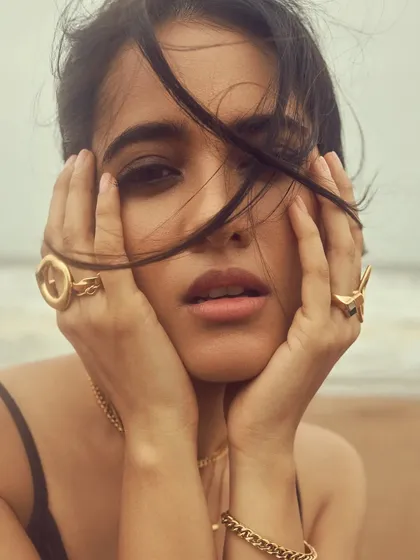 A beautiful close-up framing the face. The natural makeup look is perfect for this organic, outdoor setting.