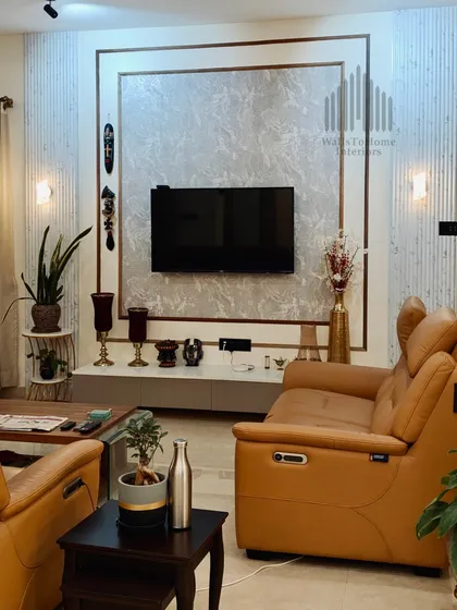 A living room is for living, and we design them for ultimate comfort and style. This space features a contemporary TV unit with a beautiful feature wall, complemented by plush leather recliners. It’s the perfect setting for relaxing with family and enjoying your favorite entertainment.