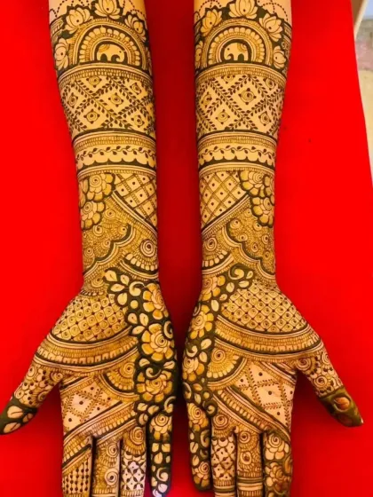 This design showcases my love for traditional, full-coverage mehandi. It is filled with classic Indian motifs like elephants and paisleys, combined with fine lines and geometric patterns for a rich, dense look.