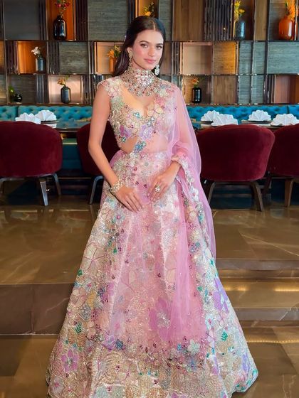 A closer look at the bodice and sheer dupatta of this summer-perfect lehenga, showcasing the intricate craftsmanship and modern design.