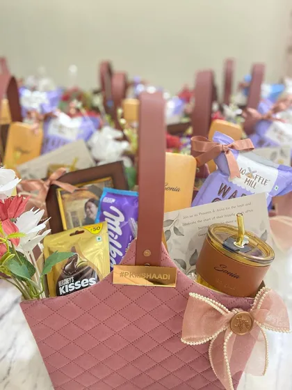 An army of love for the bride's army. We prepared dozens of these personalized quilted baskets, ensuring each bridesmaid felt cherished and appreciated.