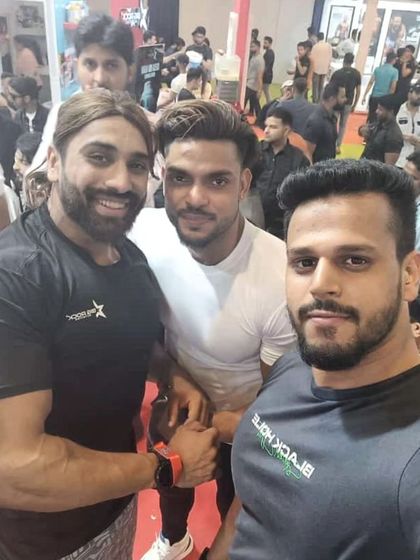 At the Sheru Classic expo with other fitness enthusiasts. The energy of these events is incredible and it fuels my passion for the sport.