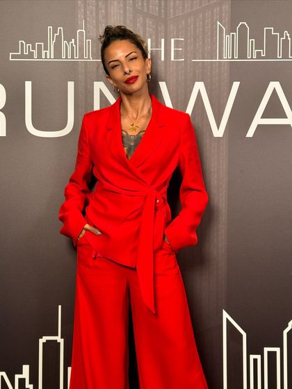 A close-up of the red suit look. It's all in the details.