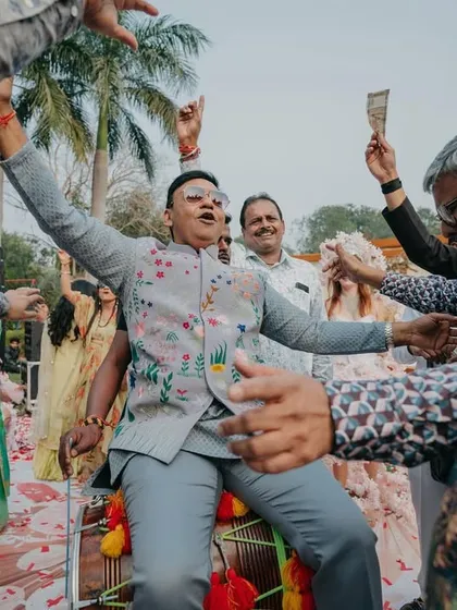 The joy of showering the baraat with money and blessings. It's a celebration of community, and I plan every detail to honor these traditions.