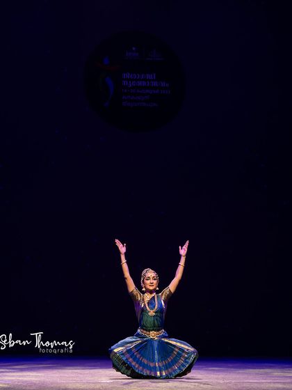 A wide shot showing the scale of the Nishagandhi stage. It is a humbling experience to perform in such a grand auditorium for an appreciative audience.