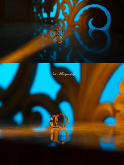 An artistic and dramatic shot of engagement rings. I used colored lights and reflections to create a unique and memorable image of this important symbol.