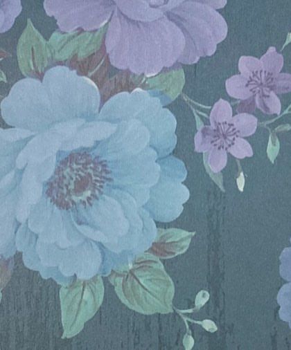 A detailed view of the beautiful floral pattern used in the background. The subtle texture and mix of blue and purple hues add depth and visual interest to the card.