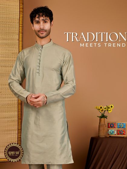 Tradition meets trend. A sage green kurta with a detailed placket, a perfect blend of classic style and modern subtlety.