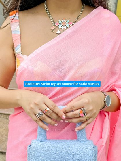 Don't be afraid to shop your closet! Here, I've used a printed bralette or swim top as a blouse for a solid pink saree. It's a great way to add a pop of pattern and create a modern, beachy vibe.