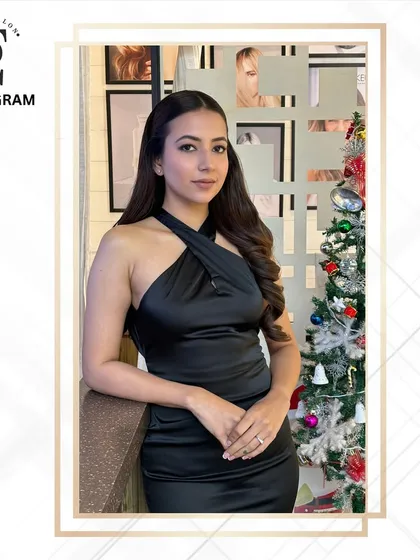 This is a perfect example of my 'date night' glam. It's an elegant and polished look with soft waves and defined makeup that enhances features without being overpowering.