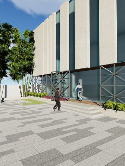 A view of the public plaza and flag post area for the Sonari Grampanchayat office, designed to be a functional and proud community space.